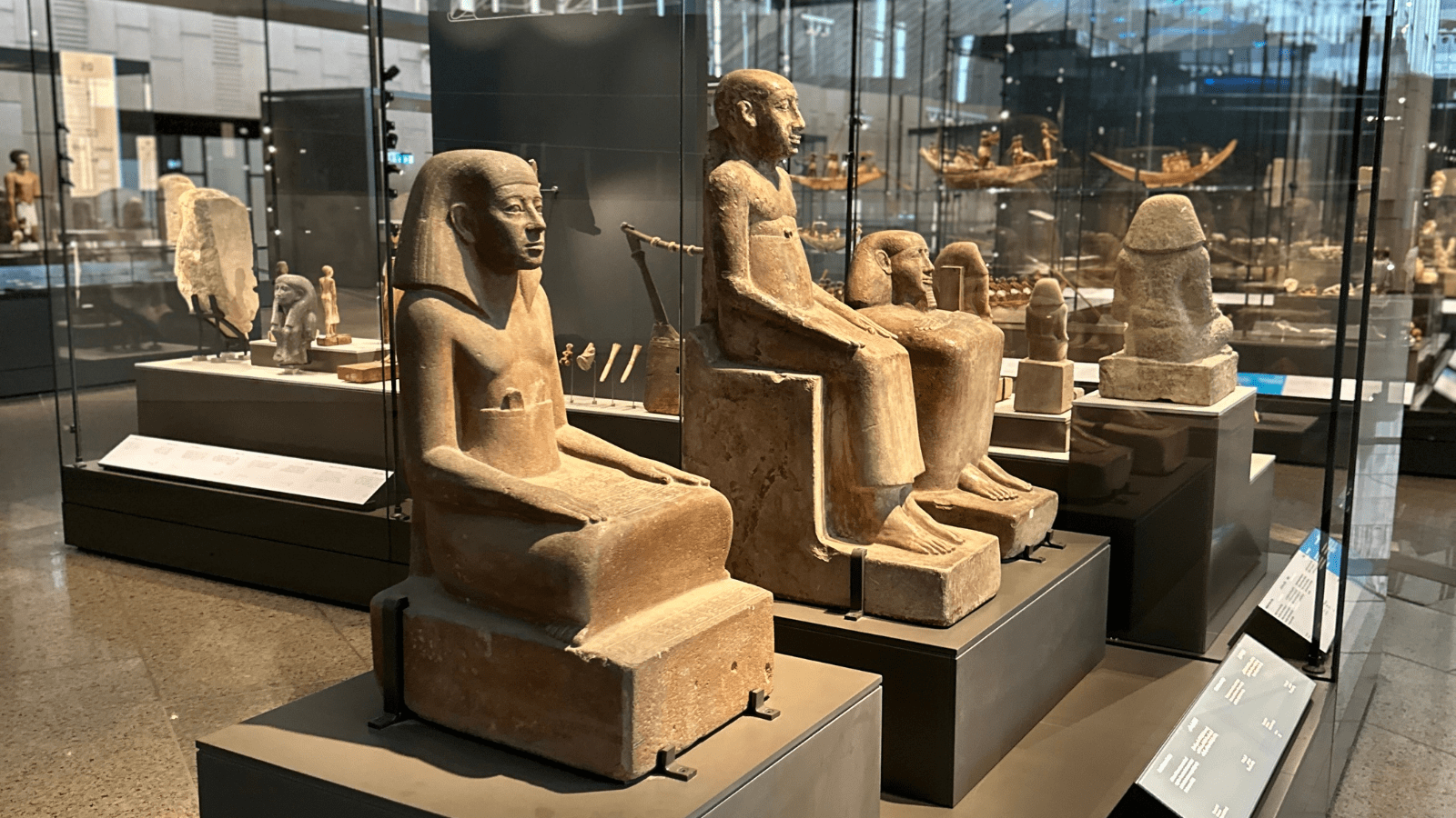 Ancient Egyptian royal objects displayed in the Grand Egyptian Museum galleries