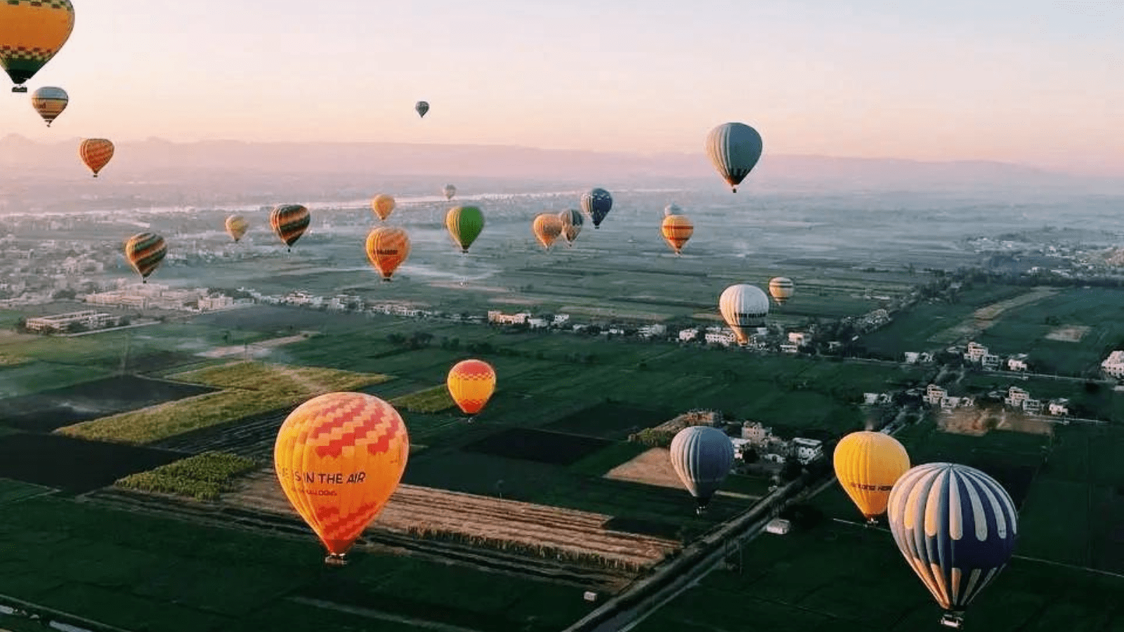 Luxor hot air balloon over West Bank near Hatshepsut Temple