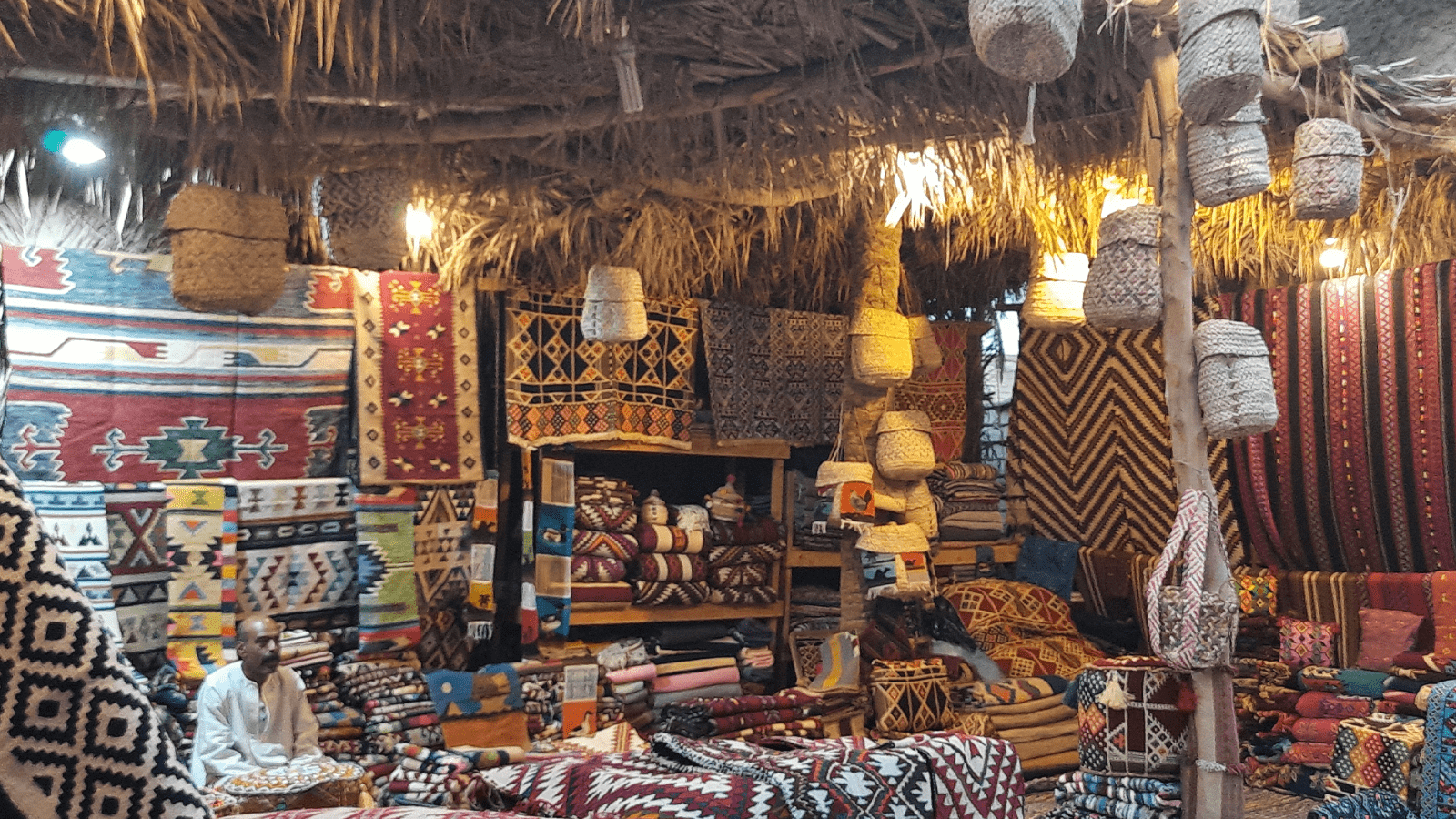 Traditional Siwan craft shop displaying woven textiles, baskets and local handicrafts