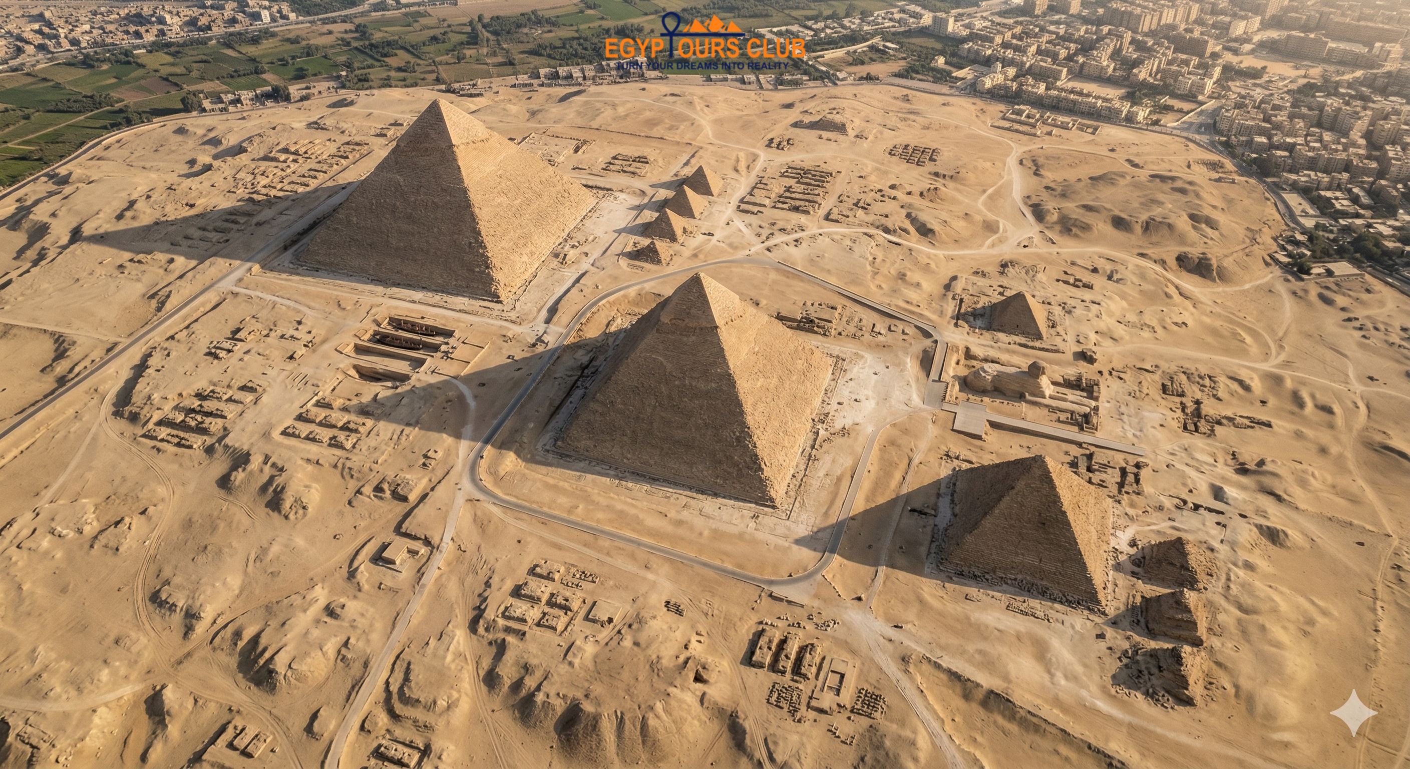 Aerial view of the Giza pyramid complex with Khufu Khafre and Menkaure pyramids